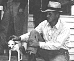 Jeff Raney petting Bozo at the Mt. Sherman Post Office